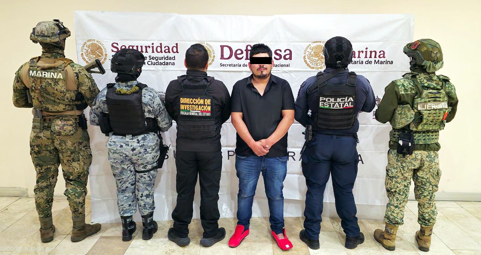 Detienen en Puebla a presunto integrante del CJNG con armas y droga